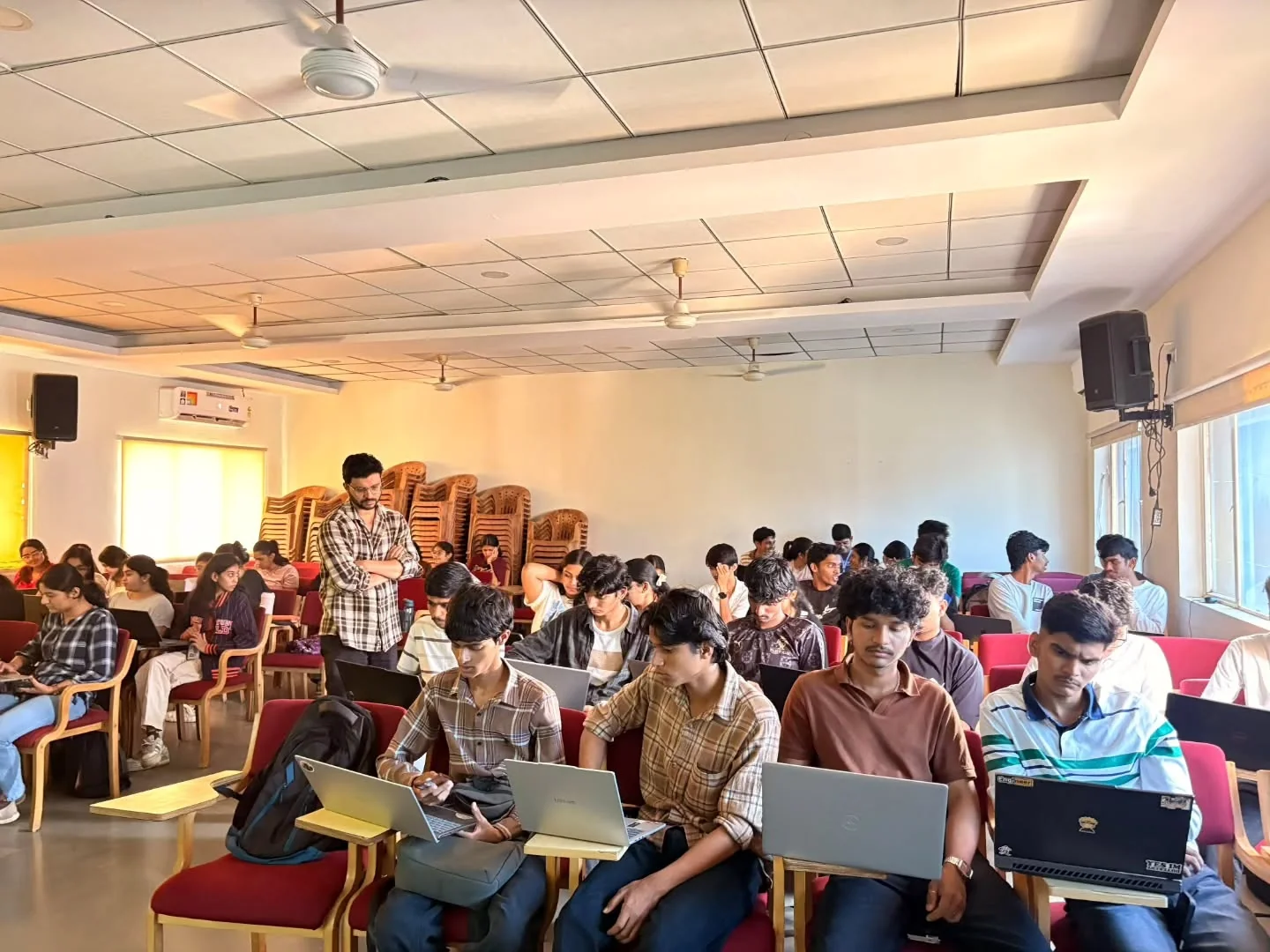 Students working on laptops during the Claude AI workshop at KLE CBALC.